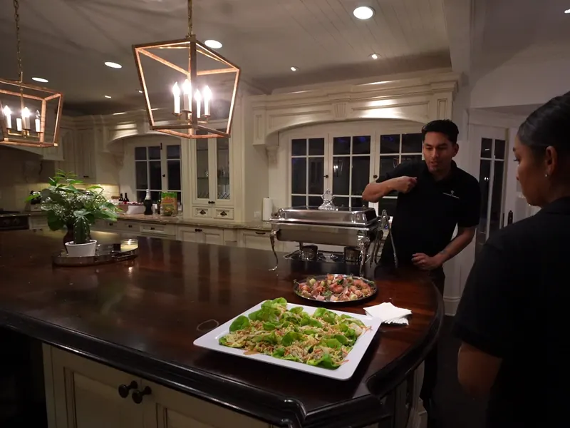 Attended buffet line set with chafing dishes for a catered event in Campbell