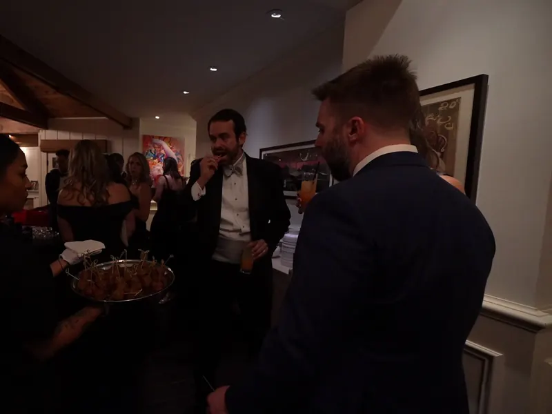 Server passing trays of appetizers to guests at a Sunnyvale reception