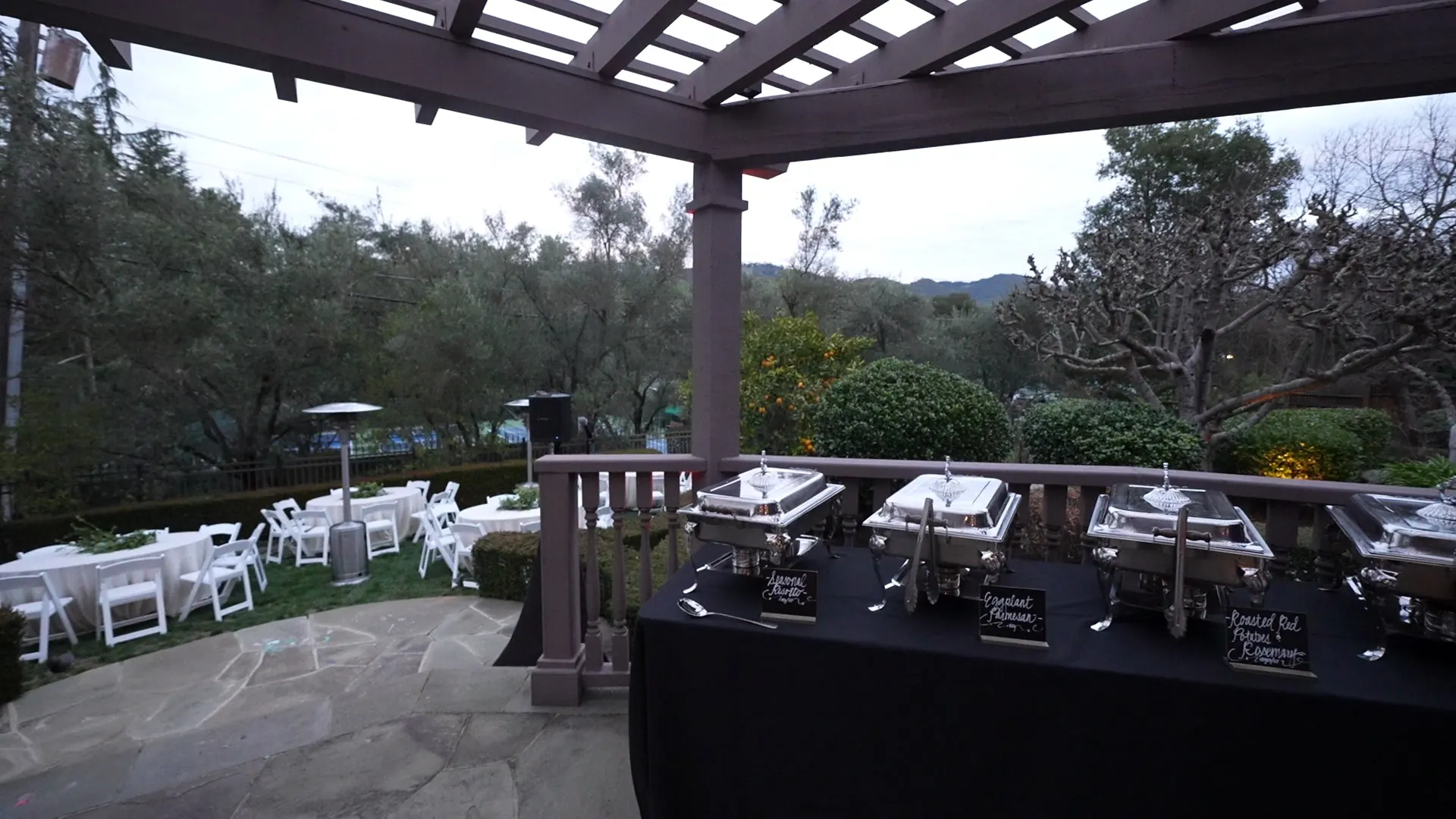 Attended buffet line set with chafing dishes for a catered event in Stanford