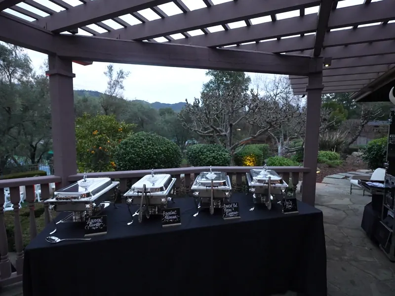 Server passing trays of appetizers to guests at a Los Altos Hills reception