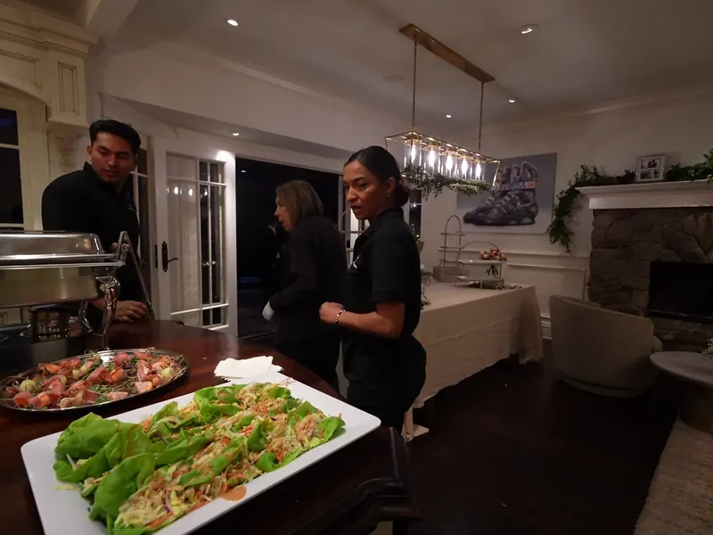 Attended buffet line set with chafing dishes for a catered event in Los Gatos