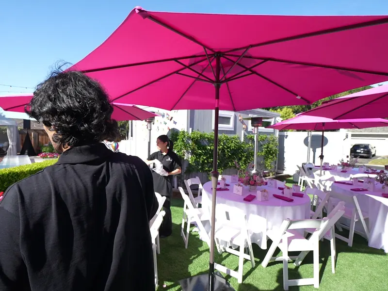 Attended buffet line set with chafing dishes for a catered event in Saratoga