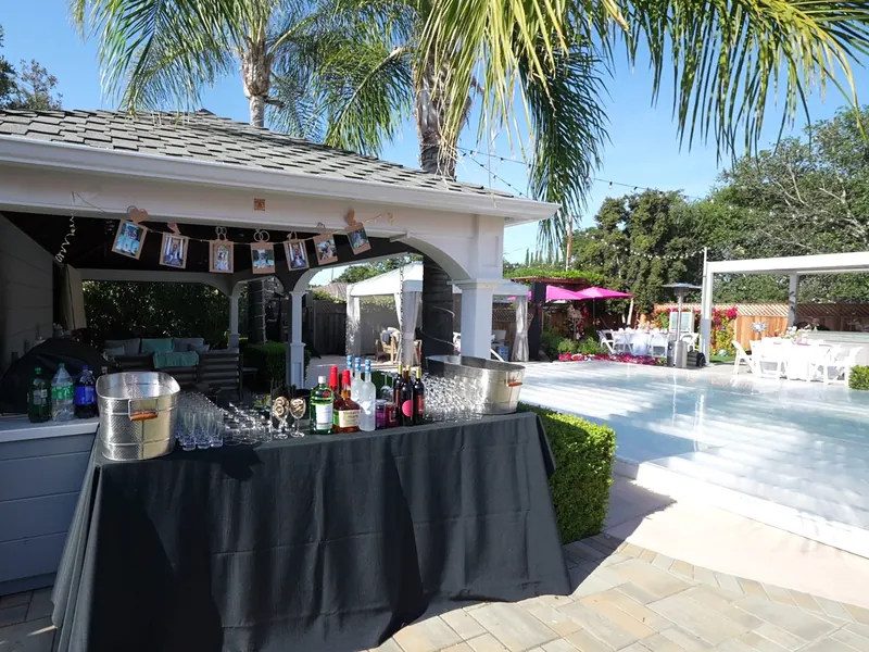 Attended buffet line set with chafing dishes for a catered event in Santa Clara