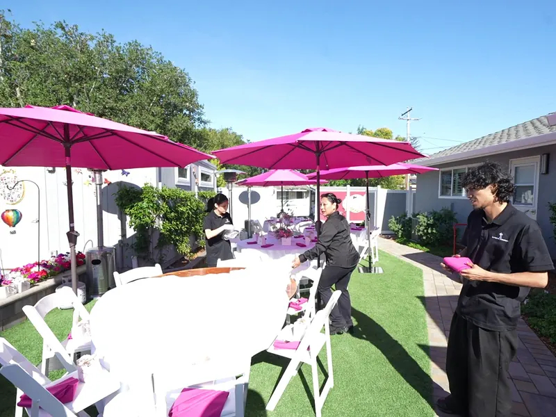 Attended buffet line set with chafing dishes for a catered event in San Jose