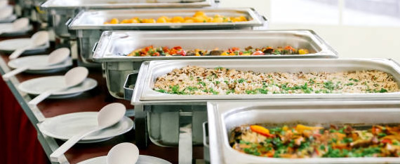 Dinner is ready for serving at a casual full-service dinner buffet