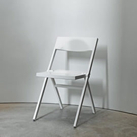 White-colored folding chair