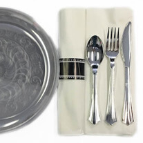 Disposable plate with spoon, fork and knife